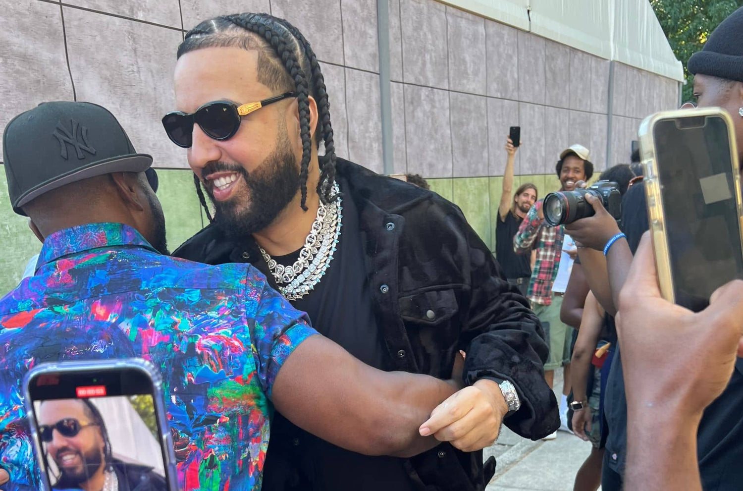 French Montana Rocks Limited Edition Sunglasses at 2023 Revolt World in Atlanta, GA