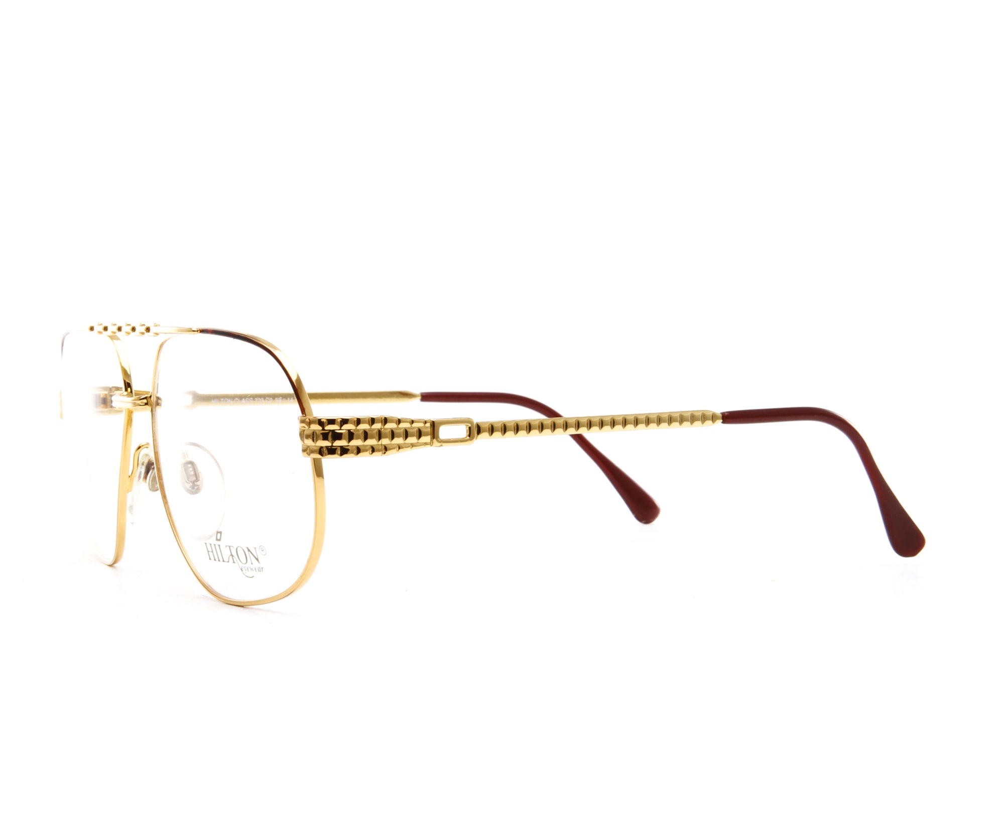 Vintage Hilton Class 703 2 24KT Side