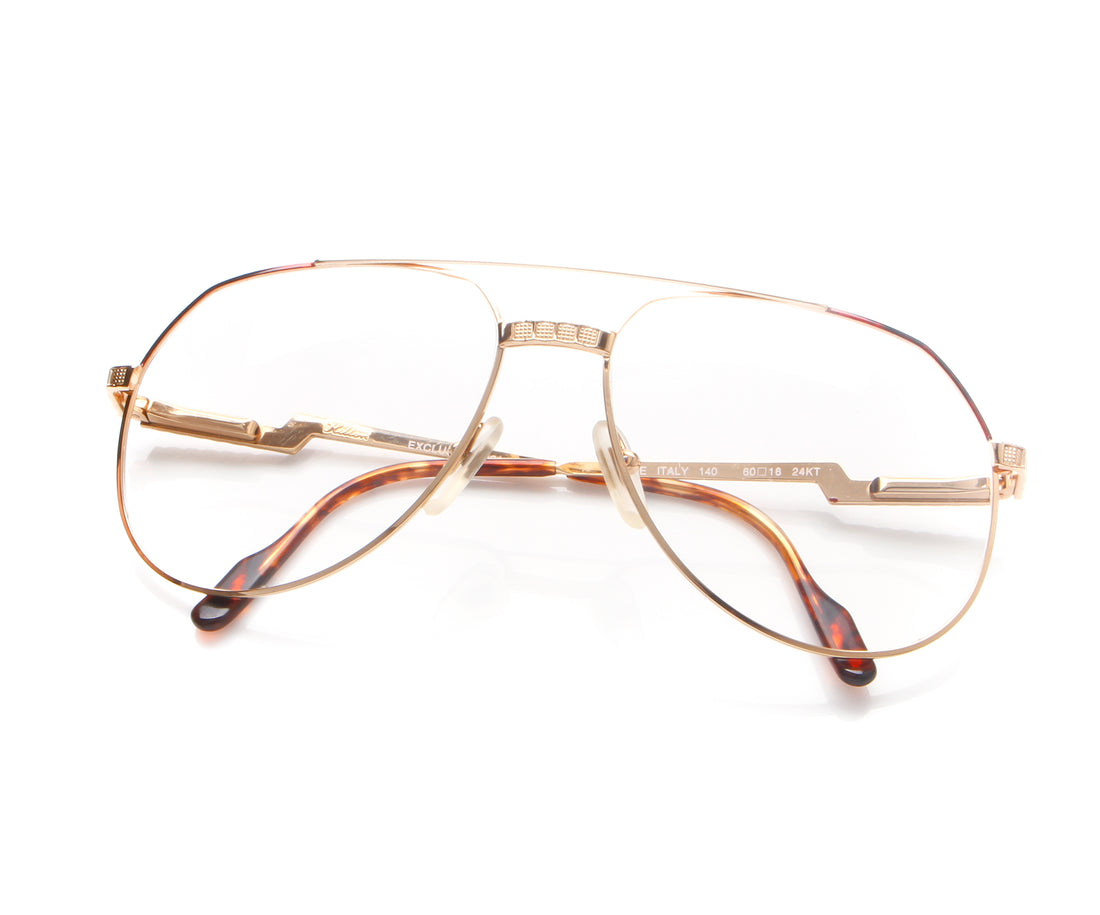 Vintage Hilton Exclusive 021 3 24KT