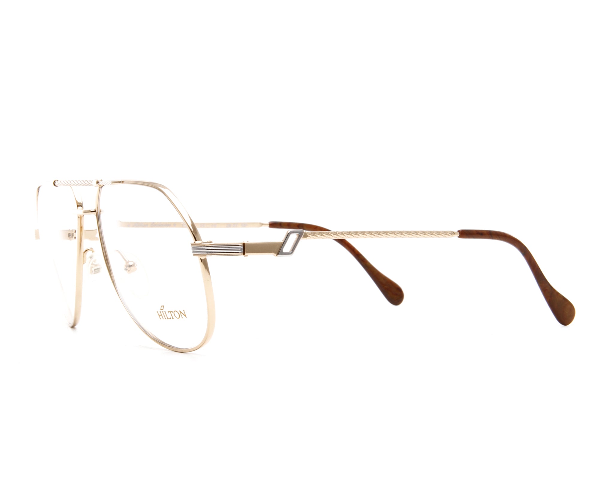 Vintage Hilton Exclusive 14 2 20KT GP Side