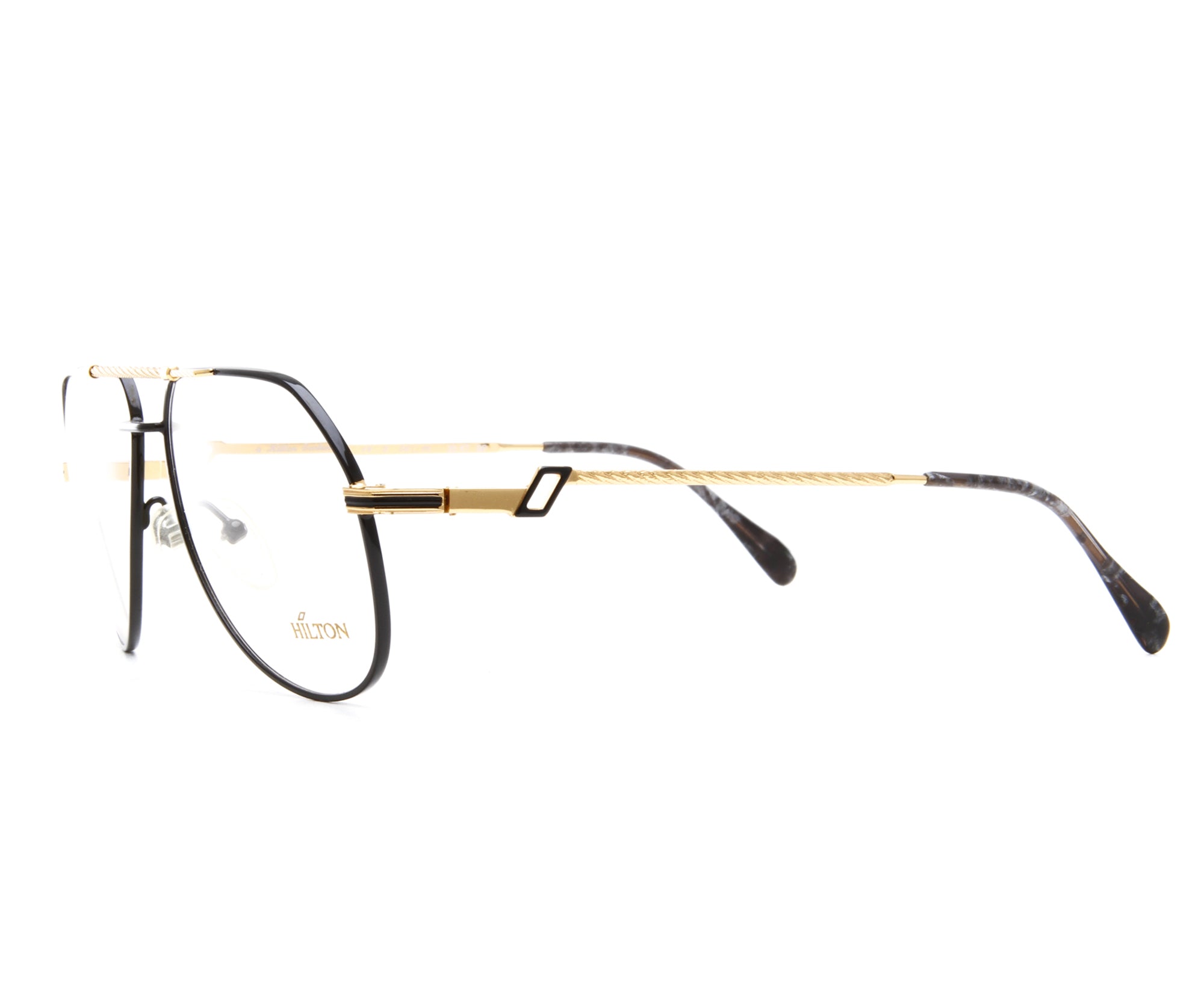 Vintage Hilton Exclusive 14 3 20KT GP Side