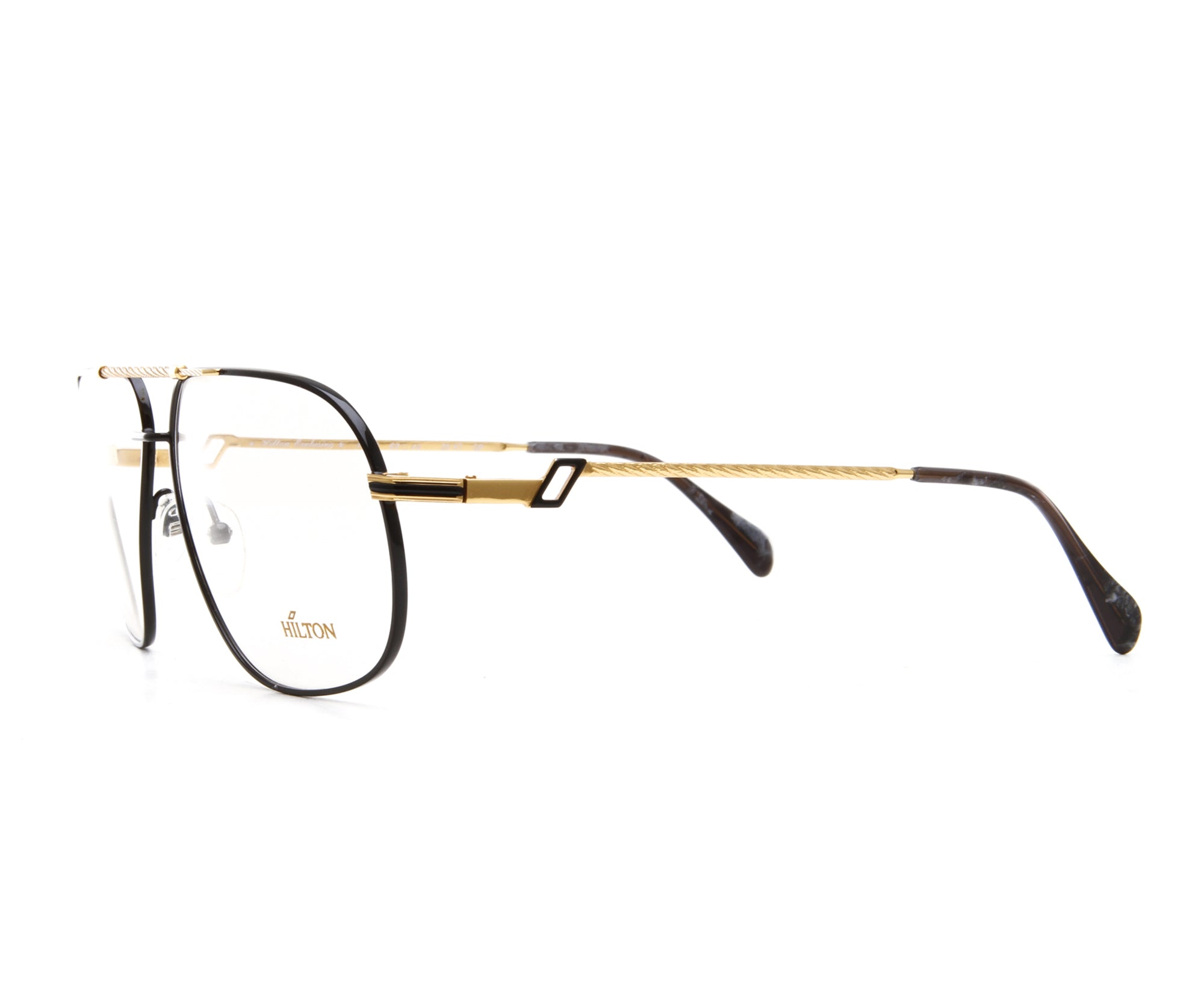 Vintage Hilton Exclusive 15 3 20KT GP Side