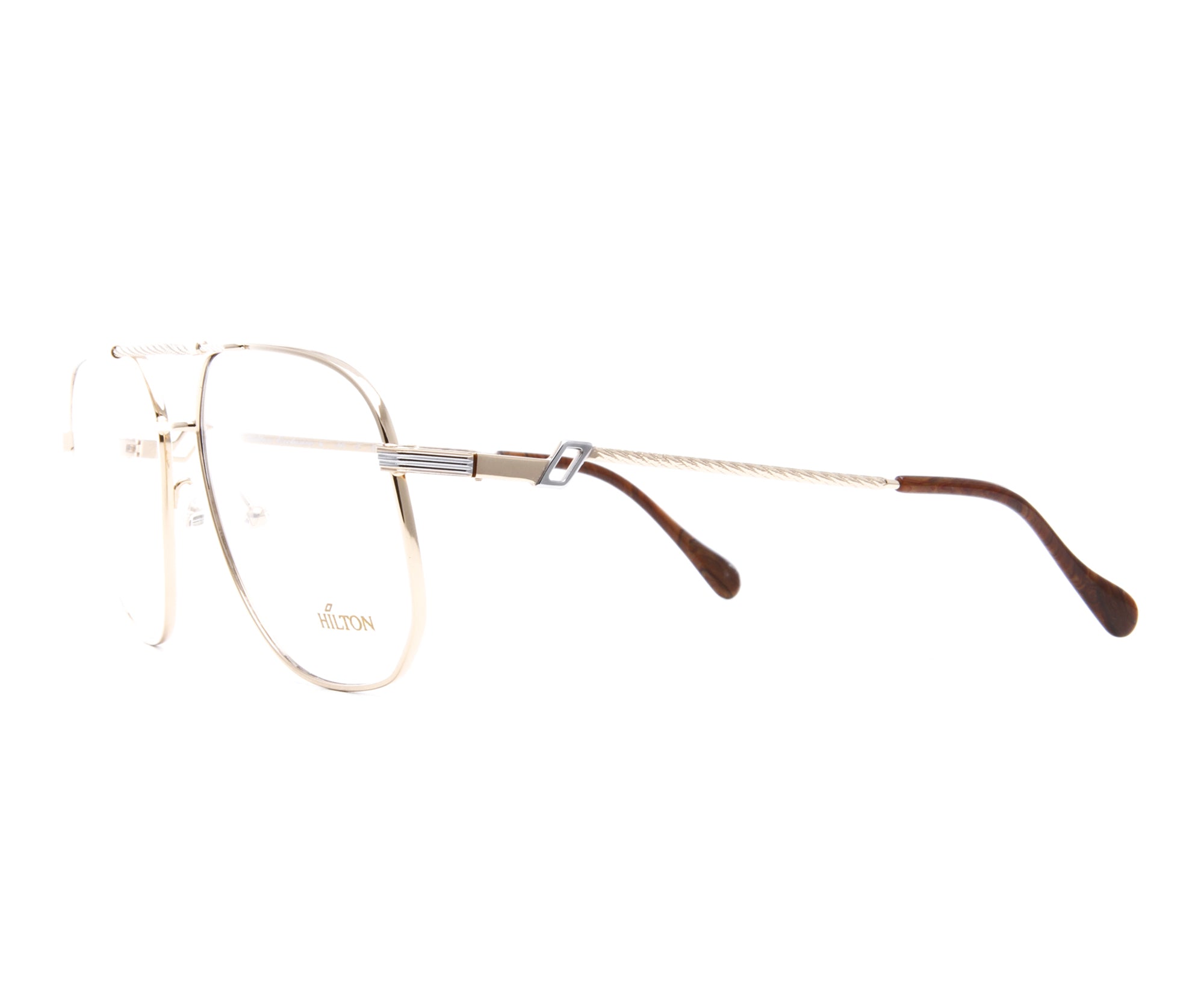 Vintage Hilton Exclusive 16 2 20KT GP Side