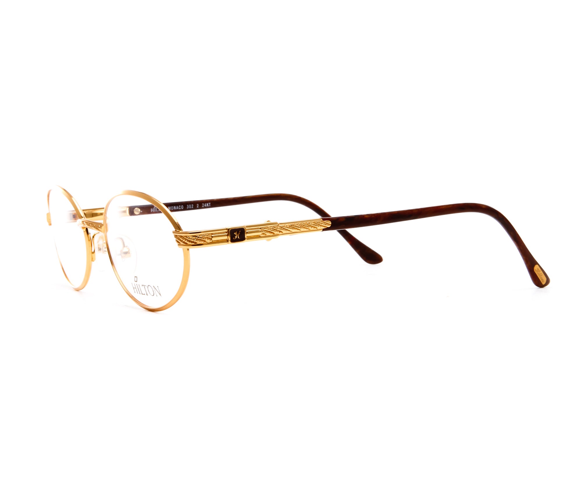 Vintage Hilton Monaco 302 2 24KT Side