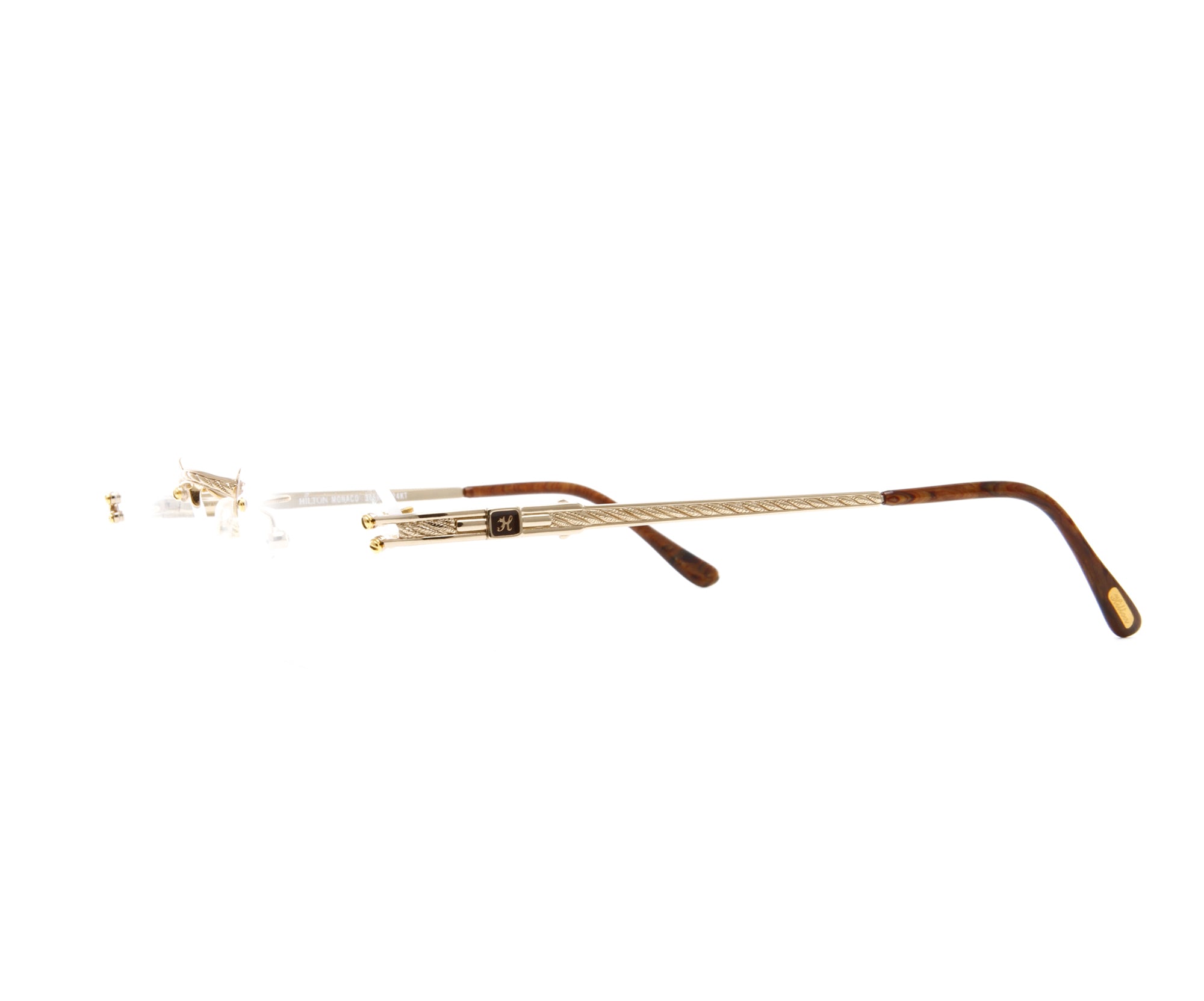 Vintage Hilton Monaco 305R 3 24KT Side