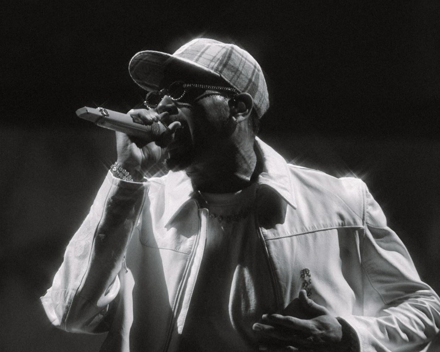 Chris Brown Shines On Stage in Vintage Frames Company Sunglasses